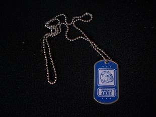 Front of the Spike's Army dog tag (Picture from Katie Risvold, 2010)